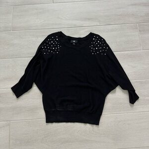 Black sweater with pearls and jewels